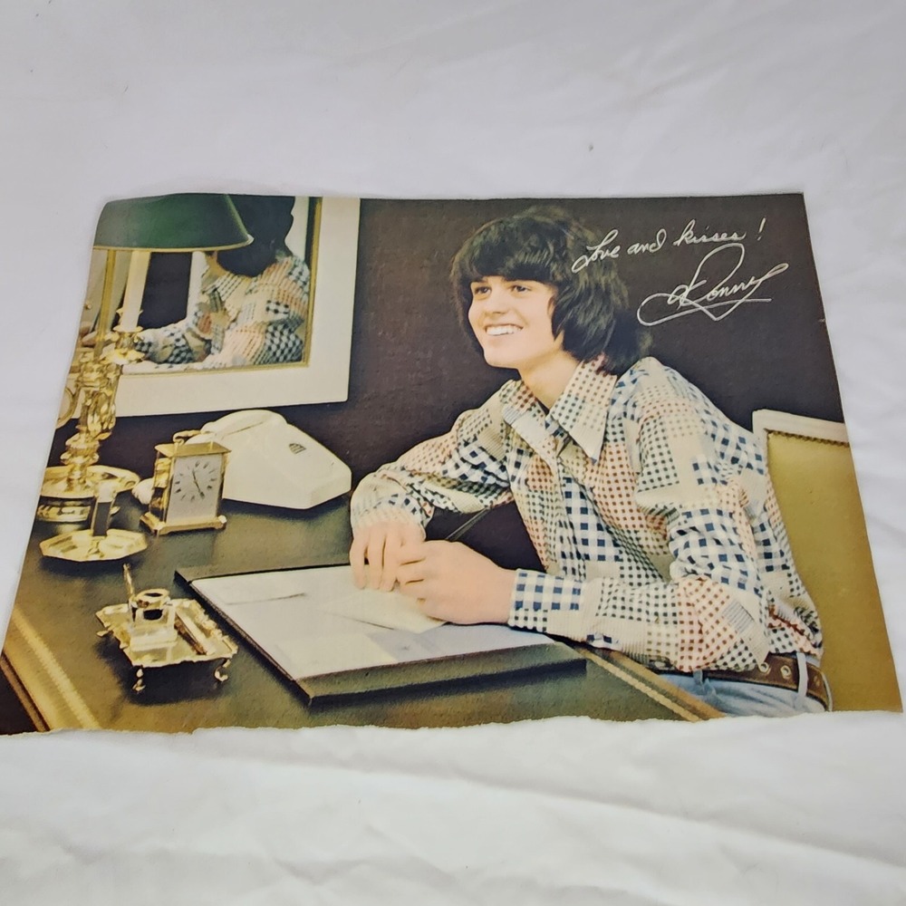 Donny Osmond sitting at desk smiling vintage pinup clipping 1970s 8"x11"